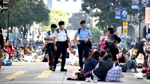 Pemerintah Hong Kong Melakukan Pemeriksaan Di Tempat Berkumpul Pekerja Rumah Tangga Asing Untuk Pelanggaran Peraturan Jarak Sosial 1-3 Januari 2021